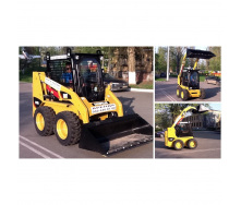 Уборка снега мини-погрузчиком Caterpillar 216 со щеткой